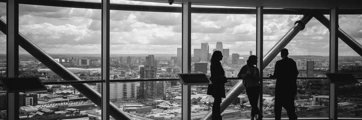 A diverse group of people collaborating on a project, representing global connection.
